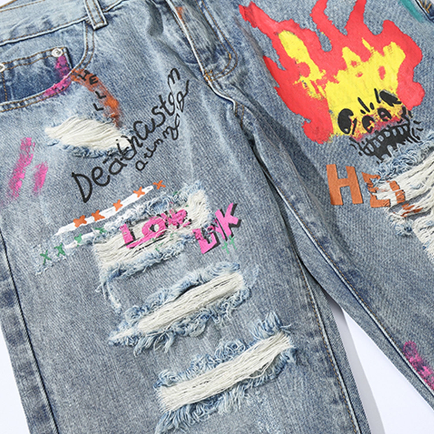 Graffiti ripped jeans