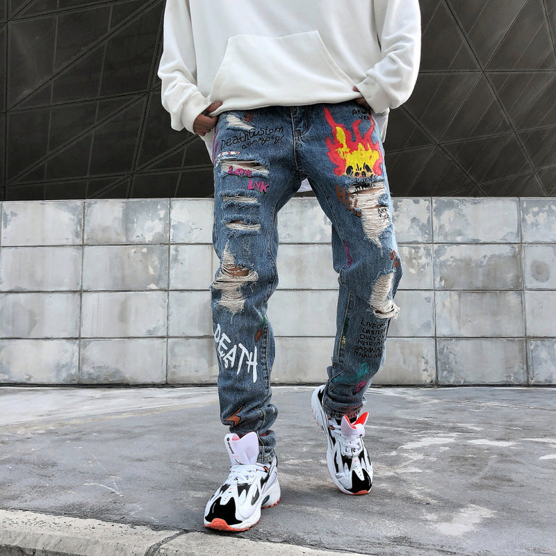 Graffiti ripped jeans